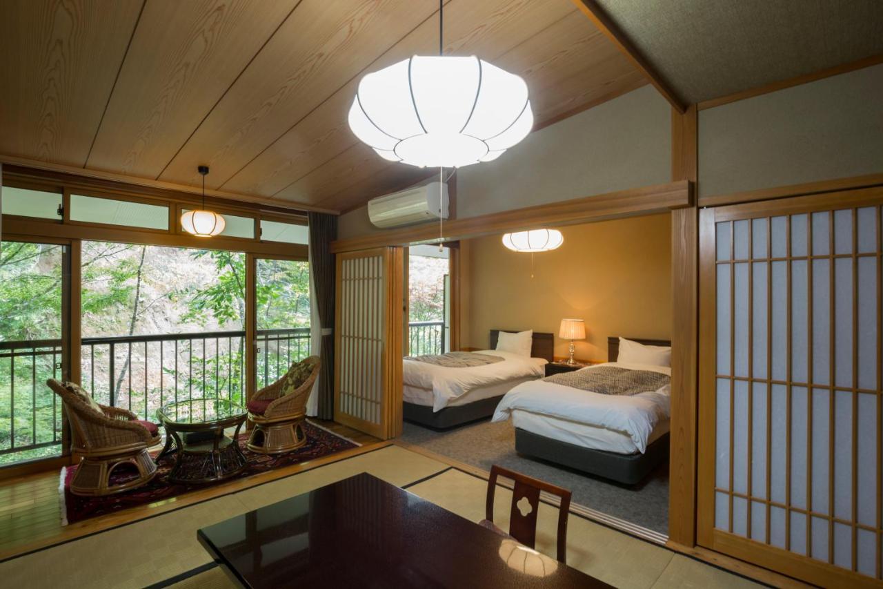 Отель Kurokawa Onsen Oku No Yu Минамиогуни Экстерьер фото
