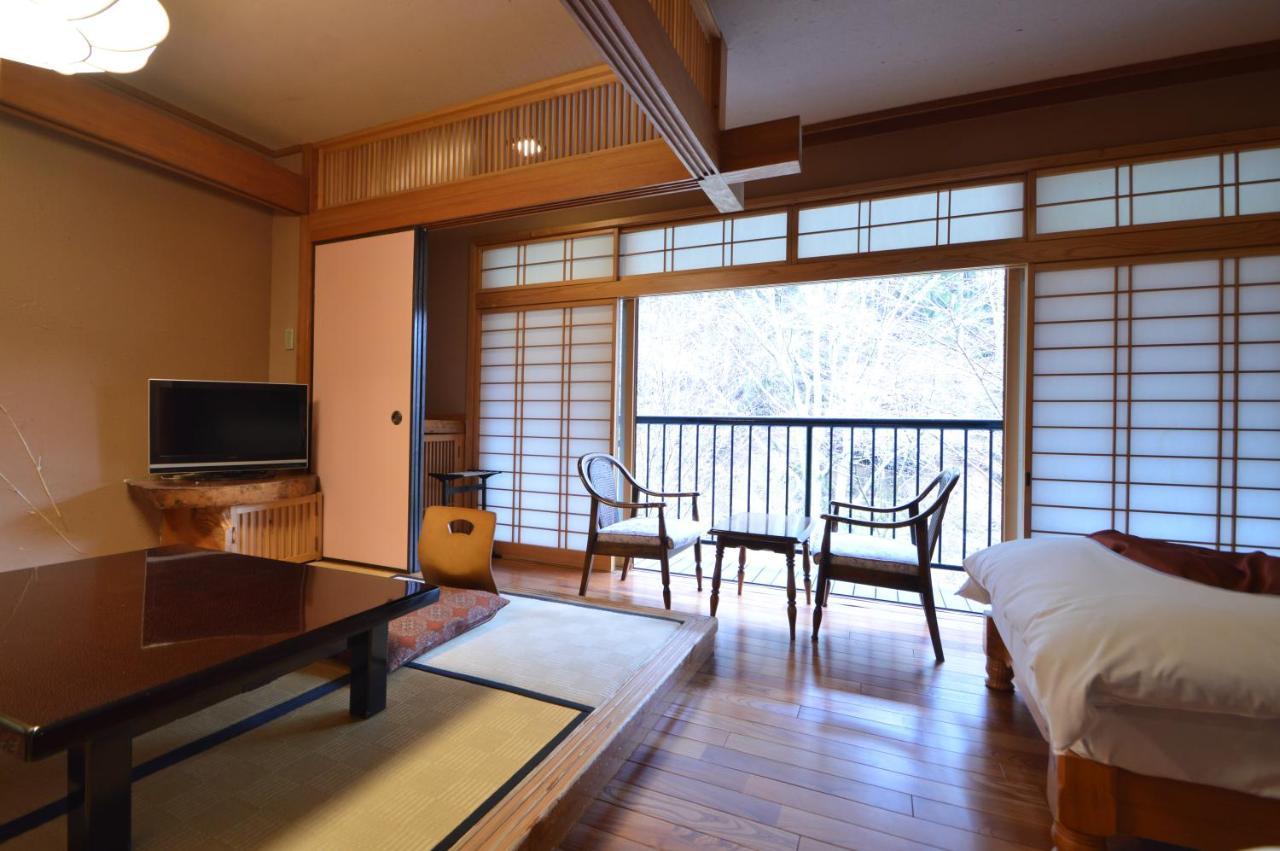 Отель Kurokawa Onsen Oku No Yu Минамиогуни Экстерьер фото